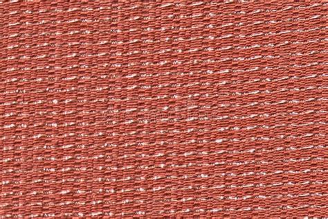 fabric interwoven with metal|A FABRIC INTERWOVEN WITH THREADS OF METAL .